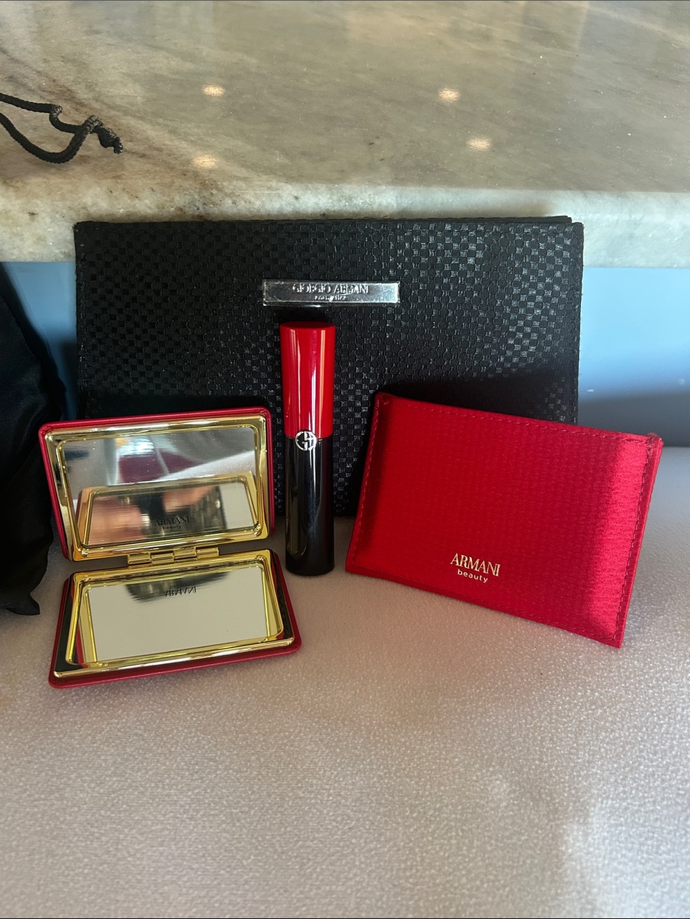 Giorgio Armani clutch, pocket mirror, lip power 404